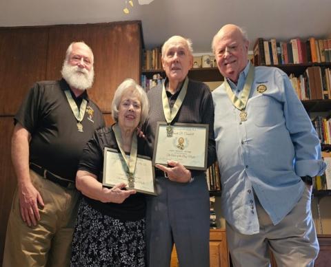 Randy Seale (left) and Joe McD. Campbell (right) present medallions and cerificates of the Order of the Bog Myrtle to Dr. Ruby Campbell and Kenn Campbell 